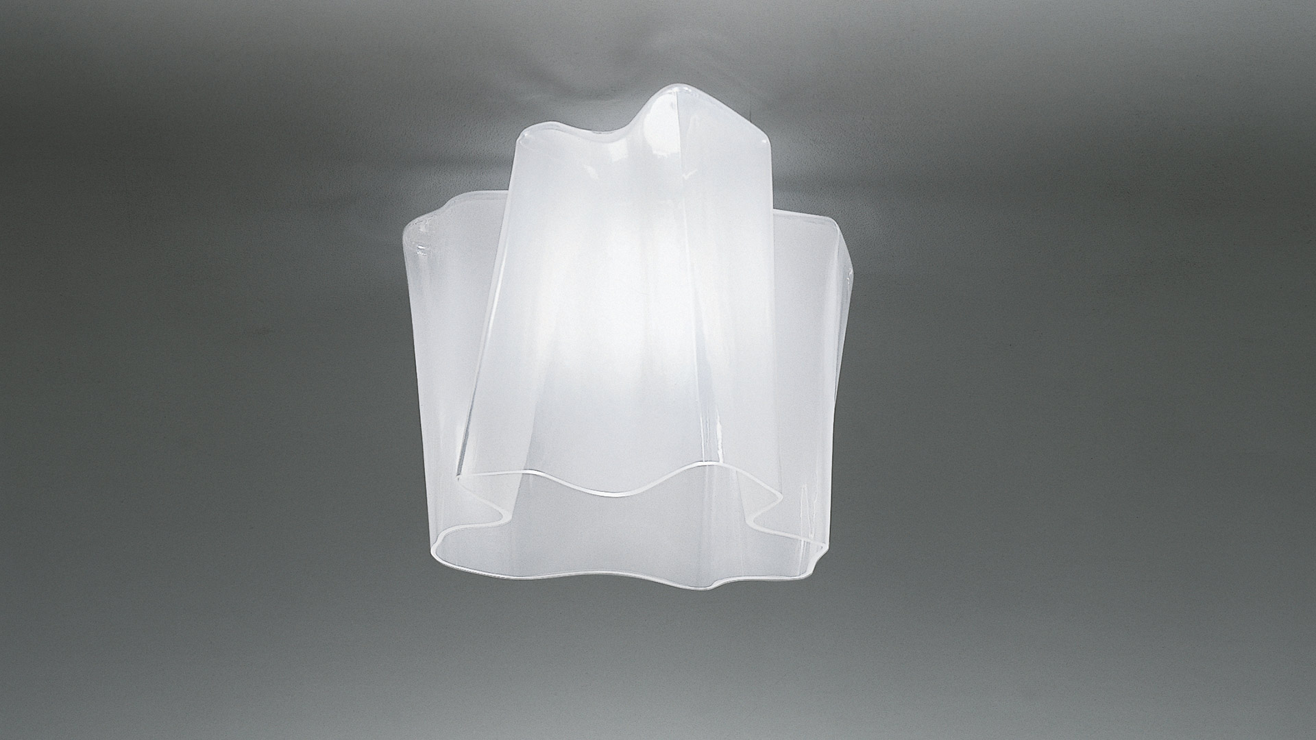 Artemide Logico ceiling lamp with layered white frosted glass diffuser in organic flower-like shape, flush-mounted to ceiling