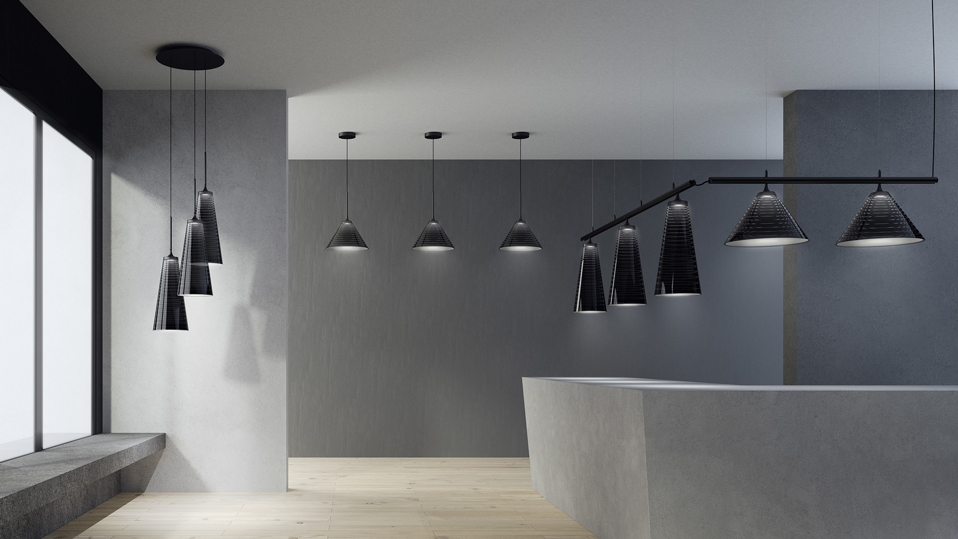 Cluster of seven Artemide 'Look at Me' smoked glass pendant lamps in varying sizes, suspended from a black ceiling canopy