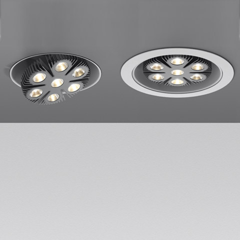 Two Artemide LoT Reflector recessed ceiling lights with six LED spots arranged in a flower pattern, shown in dark and white finishes