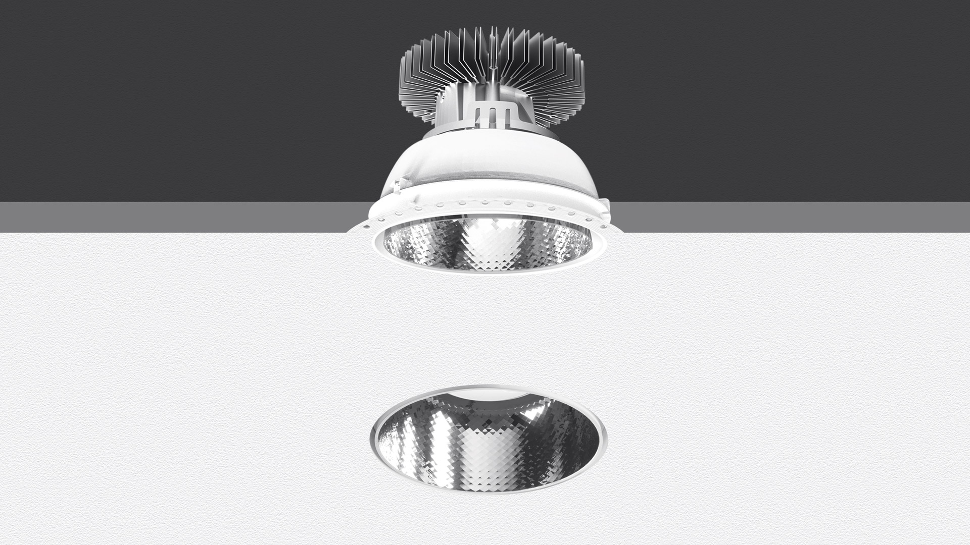 Artemide Luceri Round Trimless LED recessed downlight shown exploded view: white housing with heat sink and detachable faceted reflector bowl