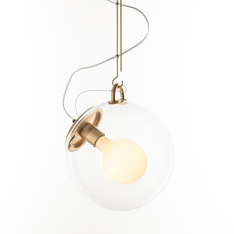 Artemide Miconos pendant lamp: clear glass sphere with exposed opal bulb, brushed brass fittings, and looped cable suspension