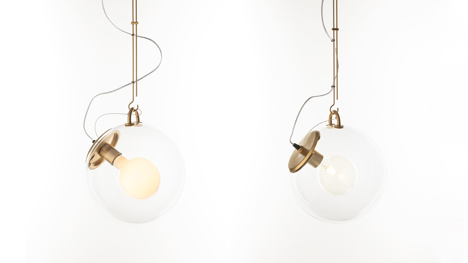 Artemide Miconos pendant lamp: clear glass sphere with chrome ring mount and sinuous cable, shown in full and detail views