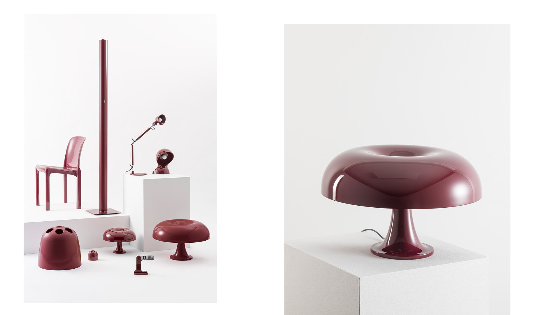 Artemide Nesso table lamp with white mushroom-shaped diffuser glowing warmly on a wooden desk beside white roses and books