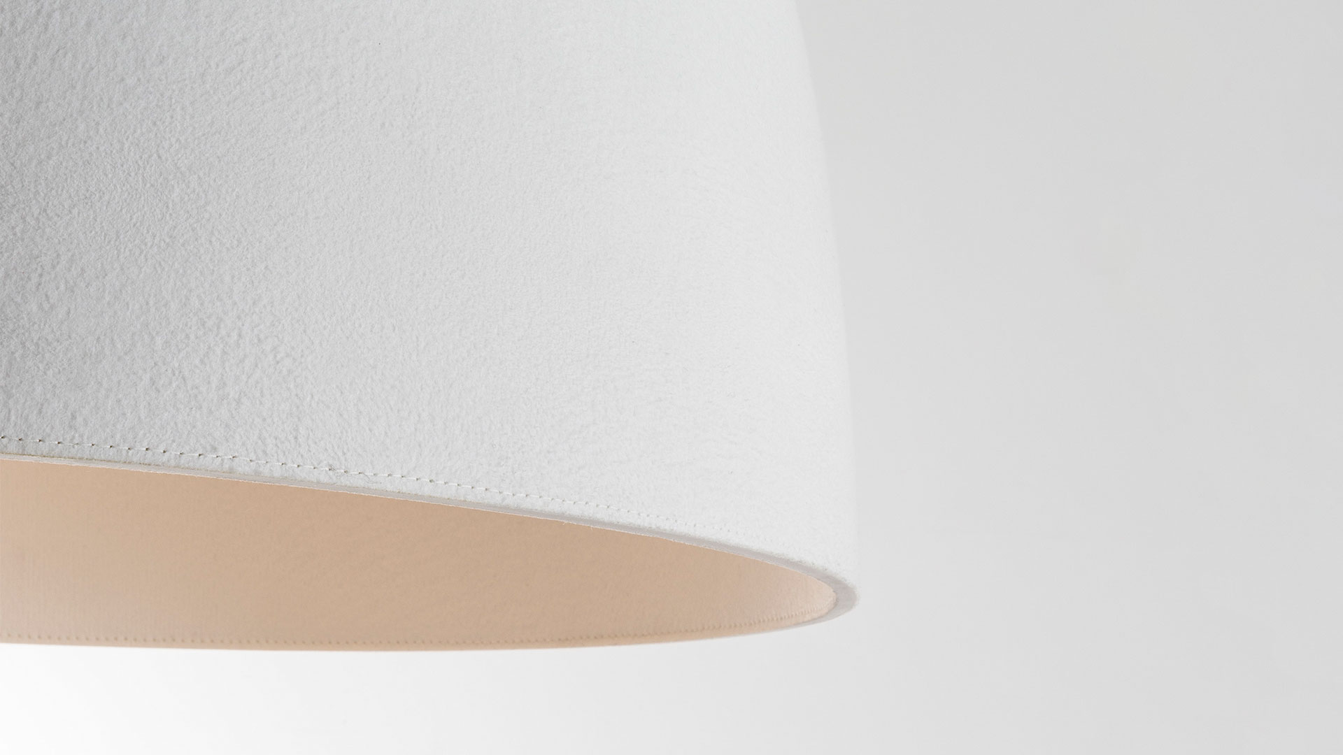Artemide Nur Acoustic pendant lamp, large white matte dome shade suspended by thin cables, providing downward diffused light