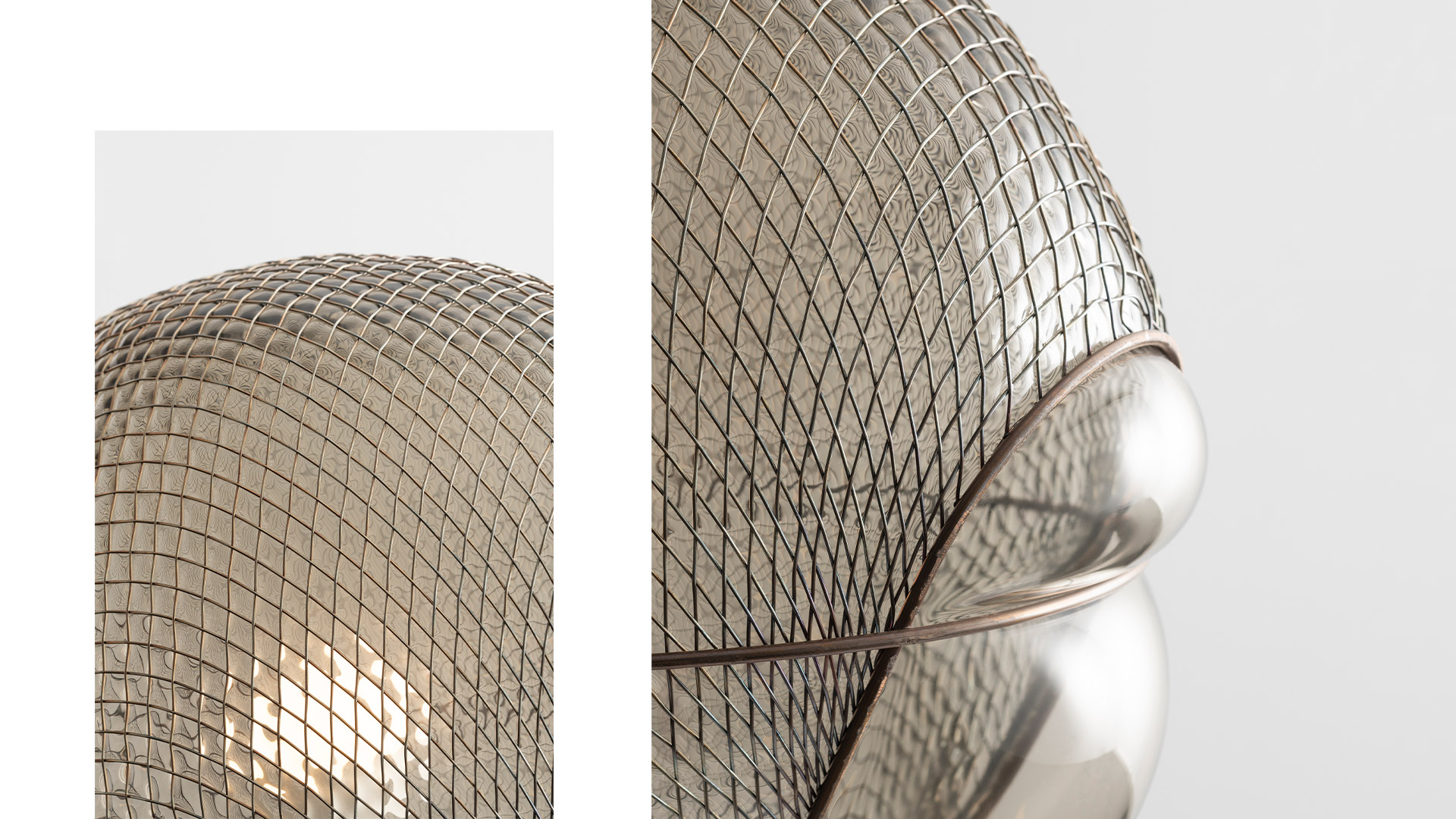 Artemide Patroclo table lamp: black metal mesh dome shade over frosted glass spherical base with visible filament bulb