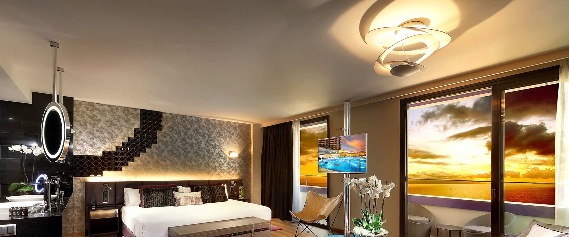Artemide Pirce Soffitto ceiling lamp with sculptural double-ring white diffuser emitting soft upward and downward light