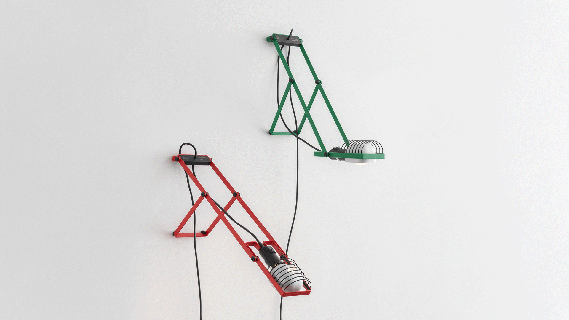 Sintesi table lamp by Artemide: red angular tripod base with adjustable arm supporting a compact LED head, on reflective black surface