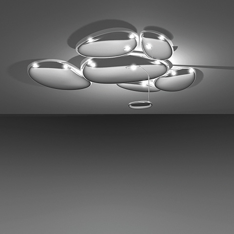 Artemide Skydro ceiling lamp: cluster of polished silver oval discs with integrated LEDs mounted flush on ceiling