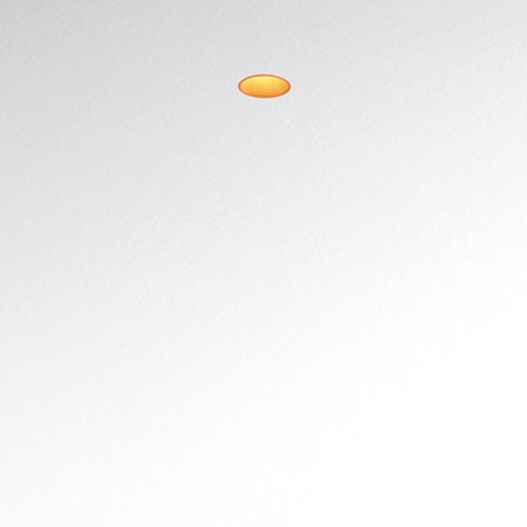 Tagora Incasso 80 recessed ceiling spotlight by Artemide, flush-mounted with a small glowing amber-orange LED aperture