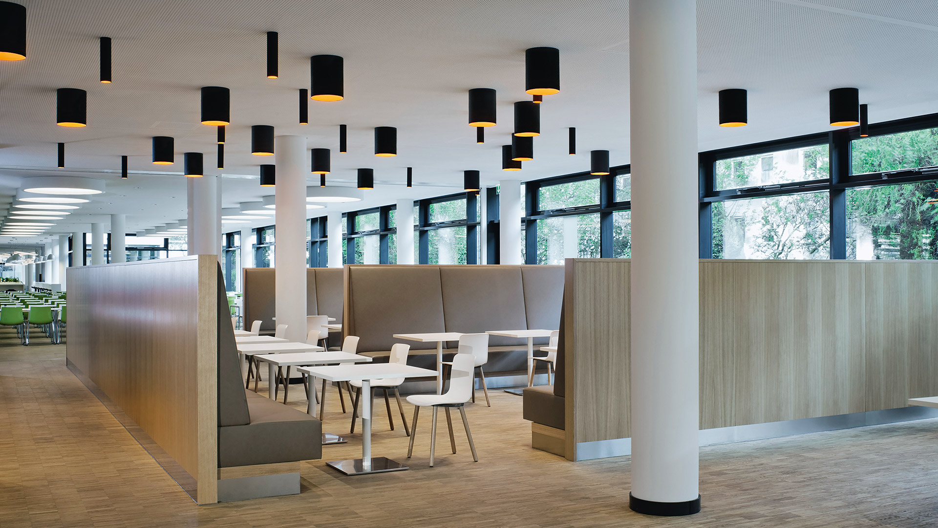 Artemide Tagora ceiling lights: cylindrical pendants and flush mounts in grey, black, taupe with contrasting green, orange, white interiors