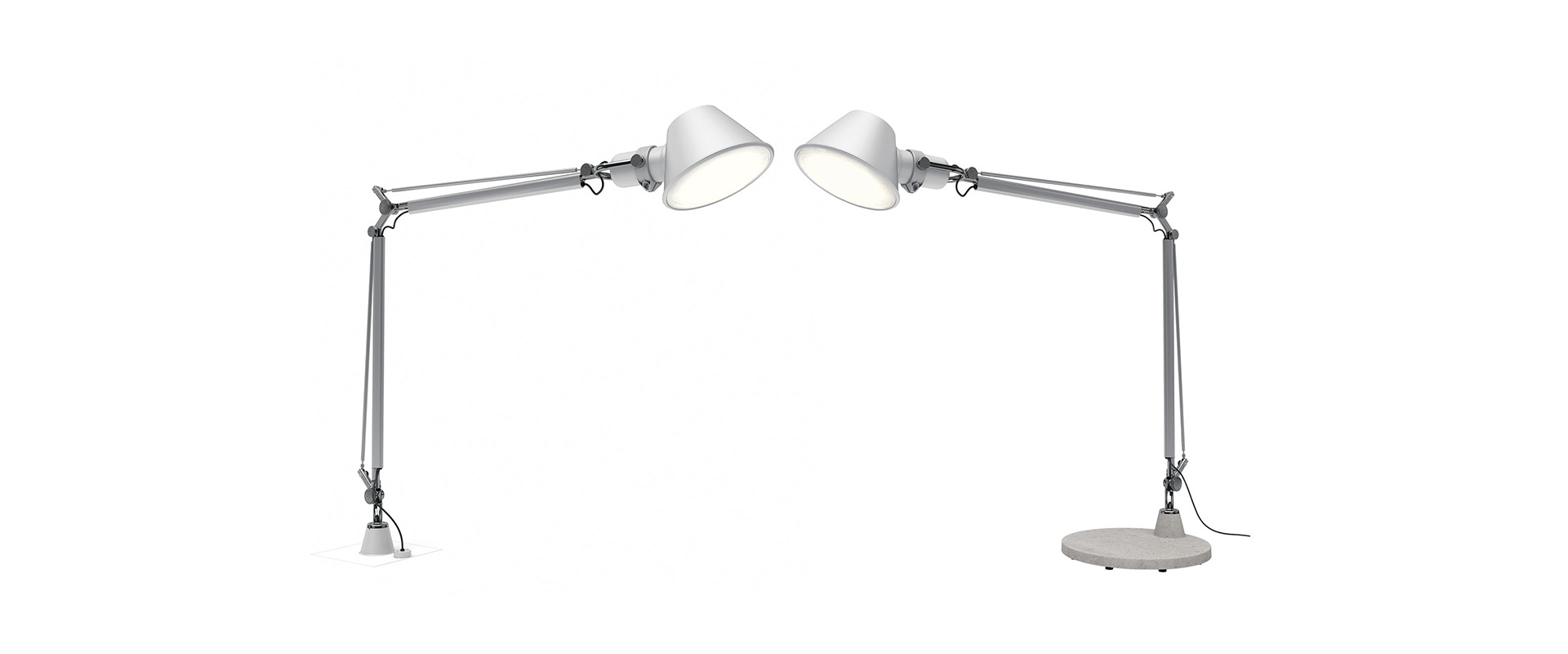 Two Artemide Tolomeo Outdoor lamps in aluminum: left wall-mounted version, right floor version with base, both with adjustable arms