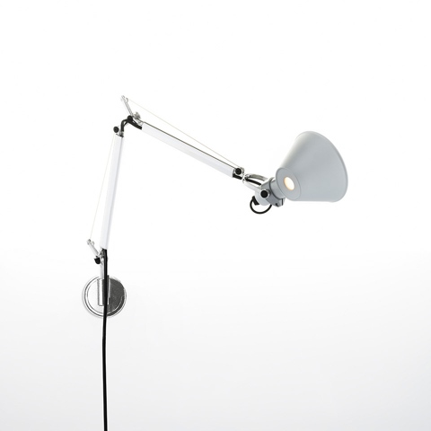 Artemide Tolomeo Micro Parete wall lamp in white, with adjustable articulated arm and conical shade, mounted on chrome wall bracket