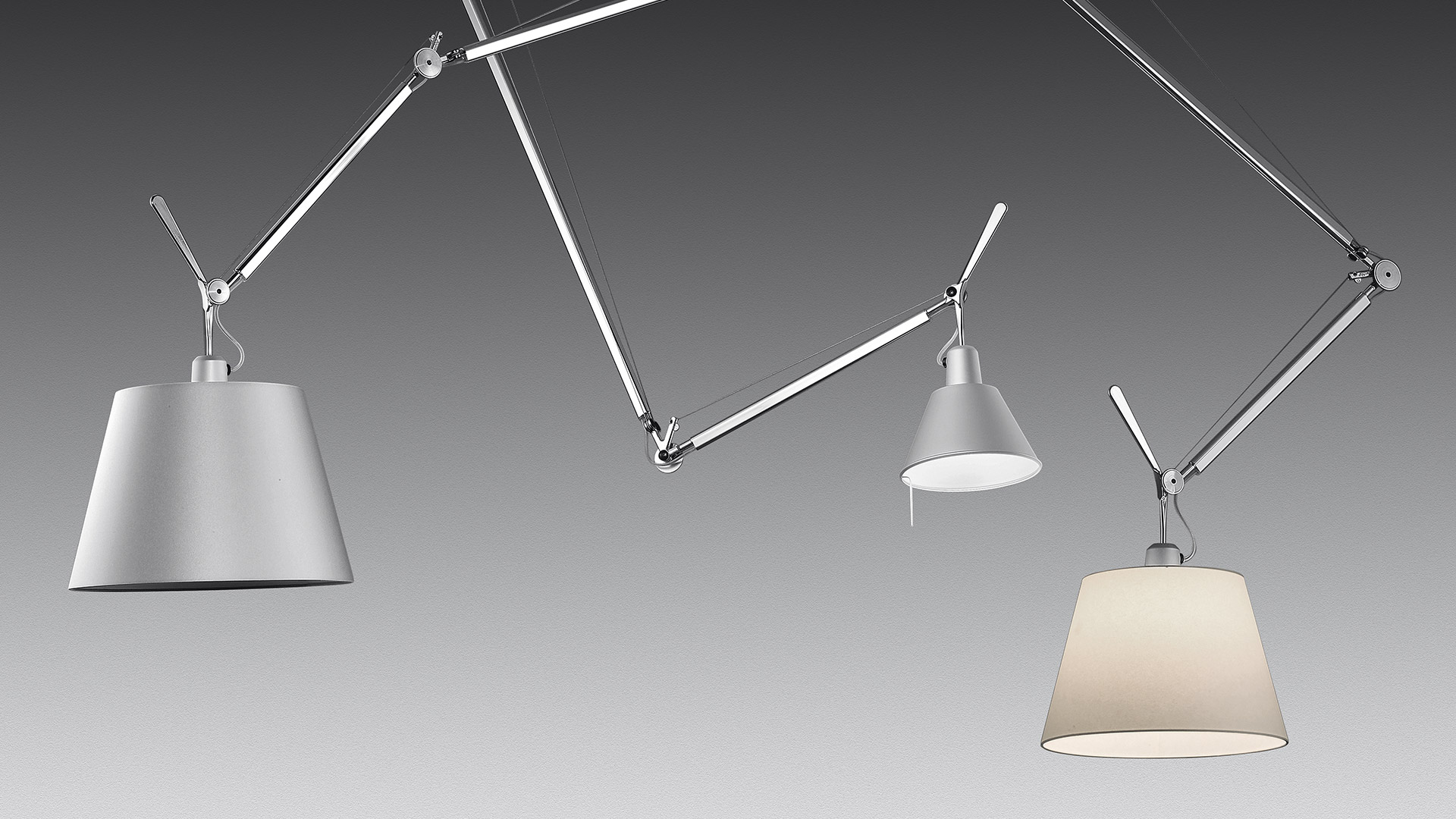 Artemide Tolomeo Decentrata Sospensione ceiling lamp with adjustable aluminum arm and white shade in a bright minimalist room