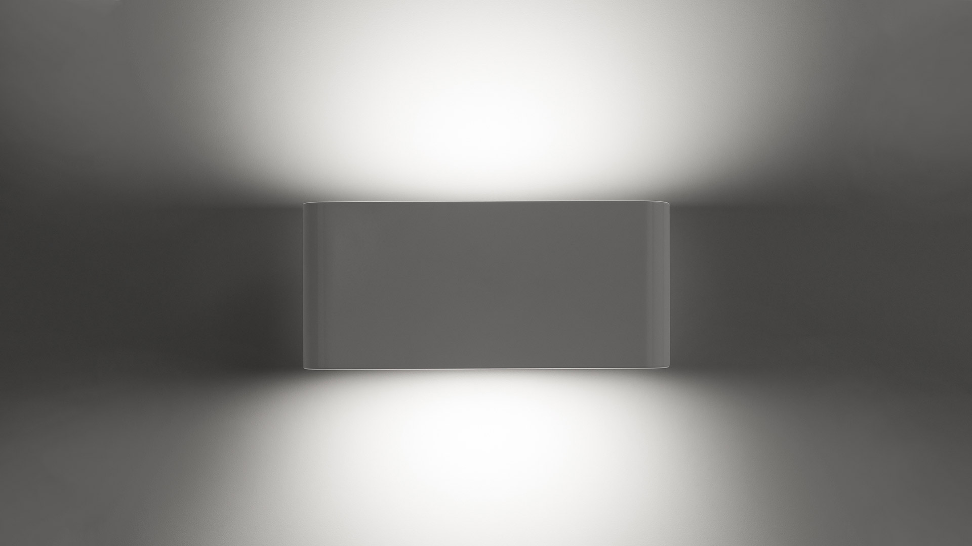 Artemide Two Flags Parete wall lamp emitting soft upward and downward light beams against a neutral grey wall