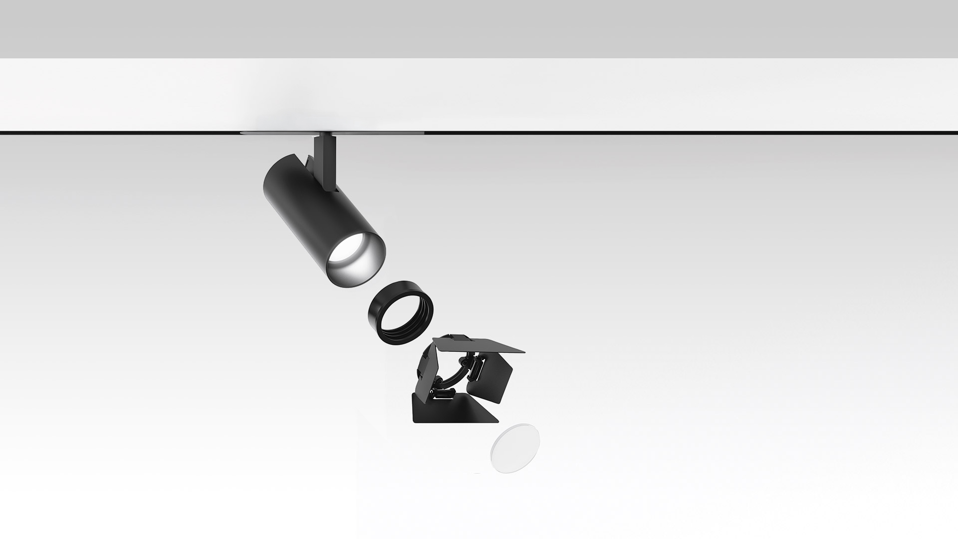 Artemide Vector Magnetic track spotlight in black, shown with modular components: cylindrical spot, barn door, and recessed versions on rail