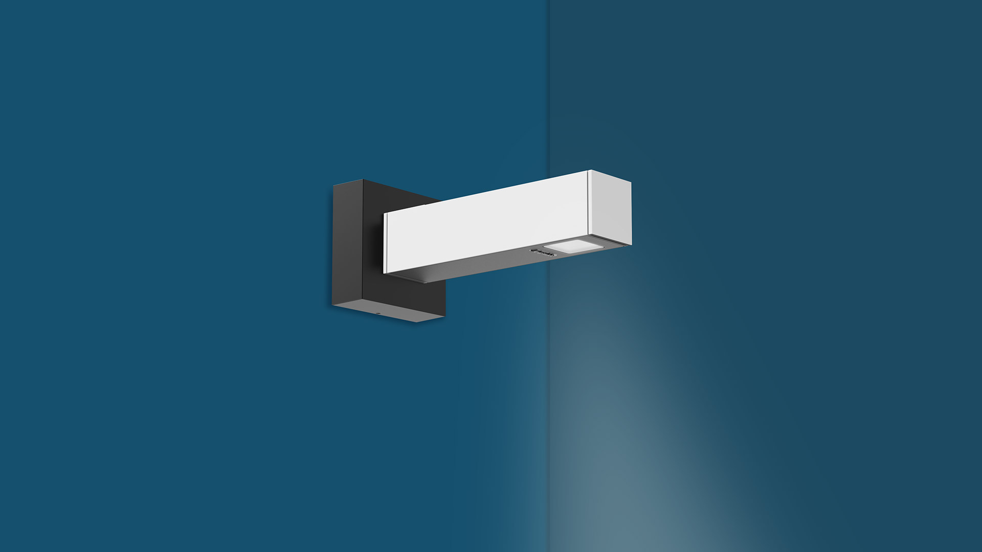 Artemide Walking Parete wall lamp: rectangular white LED fixture on dark bracket, projecting directional light downward against blue wall